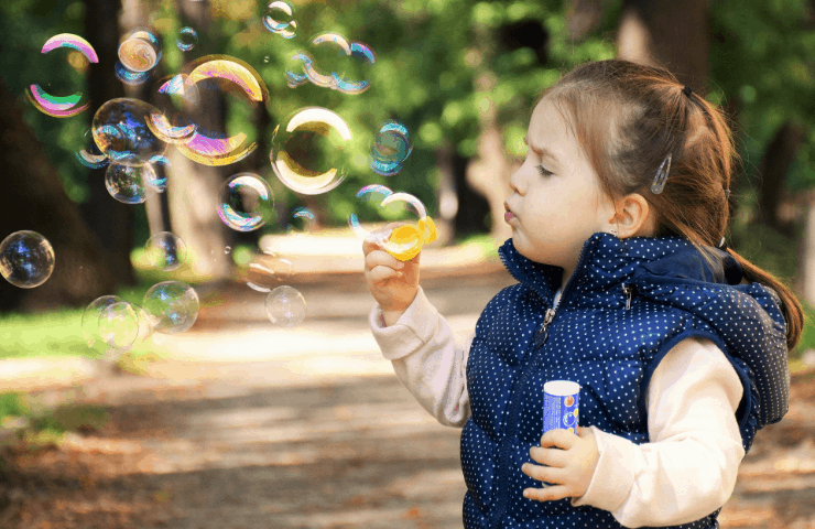 Blowing Bubbles Fun Outdoor Toddler Activity